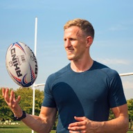 Ben John, The Rugby Trainer, with a rugby ball